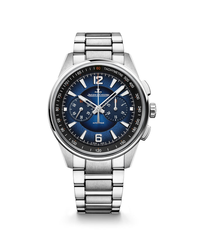 The Jaeger-LeCoultre Polaris Chronograph is a silver luxury wristwatch with a blue lacquered dial, three subdials, silver hour markers and hands, white text, a tachymeter scale, and a metal link bracelet.
